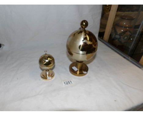 A globe cigarette holder and matching globe lighter