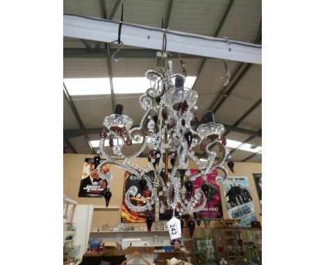 A 4 light glass chandelier