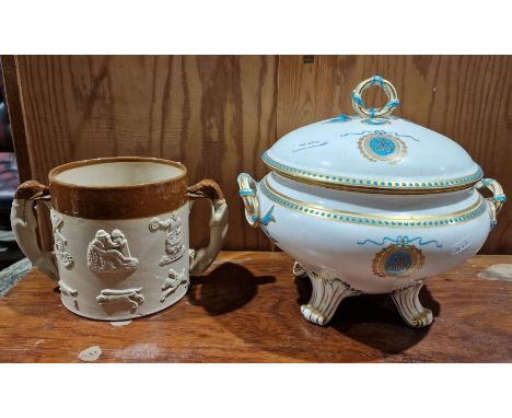 Minton porcelain tureen and cover, two-handled and on four scroll tab feet, all with turquoise and gilt jewelling, monograms 