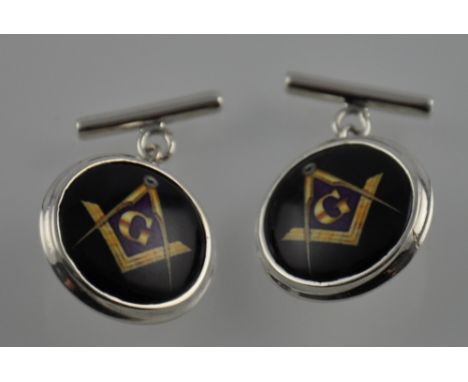 A pair of circular silver chain and bar cufflinks decorated with masonic symbols