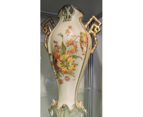 A pair of early 20th century Continental Worcester style blush pottery vases painted with floral sprays