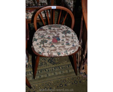 An Ercol Windsor stick-back Stool with Sanderson's Hunting scene fabric upholstered cushion.