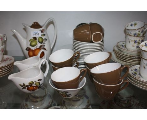 A Midwinter 'Oranges &amp; Lemons' Coffee set including eleven cups &amp; saucers, six side plates, sugar bowl, two cream jug