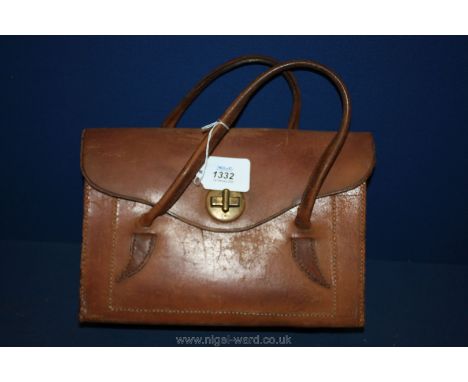 A vintage leather handbag.