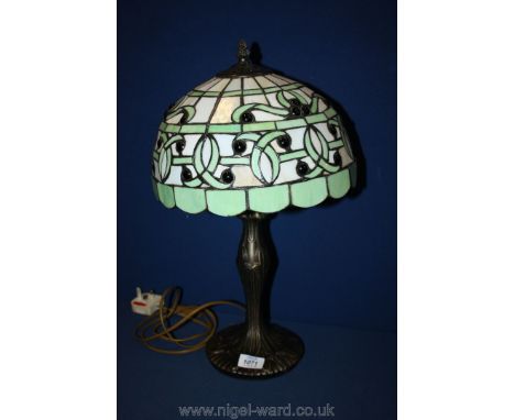 A Tiffany style table Lamp with green and brown shade