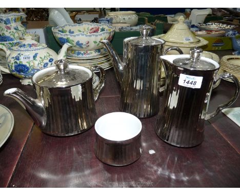 A Royal Worcester silver lustre Teapot, water jug, coffee pot and sugar bowl