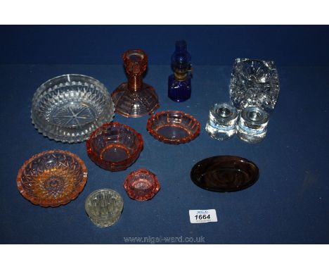 A box of mixed glass to include four candle holders, rose flower stem holder, miniature blue glass oil lamp and trinket dishe