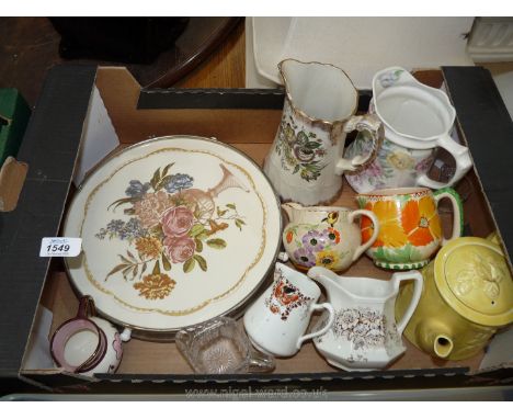 A quantity of china including cake plate with metal swivel base, jugs, teapot, etc.