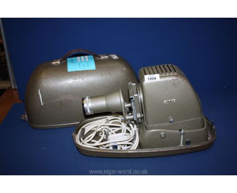 An Aldis projector in green metal carry case.