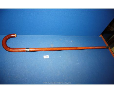 A walking Stick with silver collar by Ben Cox of London and engraved R.D.B. June 1926.