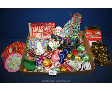 A box of vintage Christmas decorations including lanterns, baubles, garlands, etc.