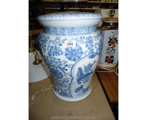 An oriental blue and white ceramic Stool with pierced detail 