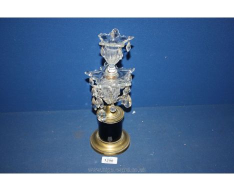 A cut glass Candlestick with droppers on a brass plinth, a/f.,