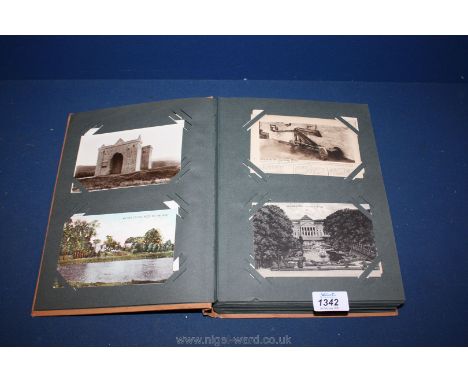 An orange Album of vintage Postcards, 180 approx.