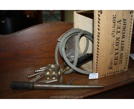 An old Pine 5 lb tea chest containing jewellery making tools including a blow lamp, formers, a brass melting/forming block, a