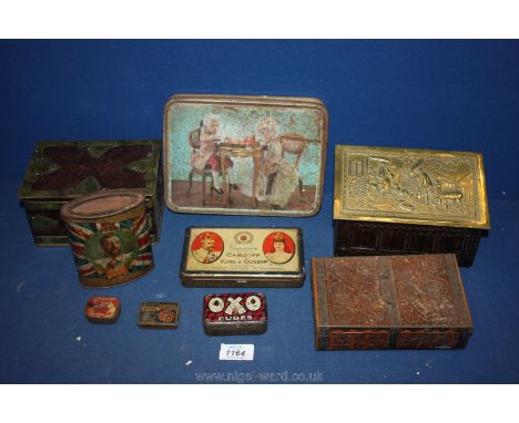 A quantity of vintage tins including Oxo, HMV etc and a miniature brass coal scuttle.