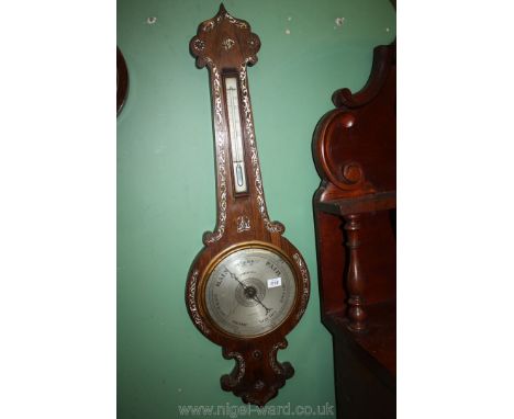A wooden Barometer/thermometer by Griffiths of Ludlow, with Mother of Pearl decoration.