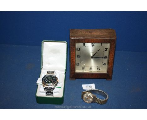 A souvenir limited edition Royal Marines Commando watch and a Clock from Pleasance &amp; Harper, Bristol.