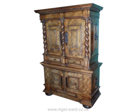 A highly collectable Continental design mixed hardwoods campaign Chest/Cabinet on Chest/Cabinet, the base with a pair of oppo