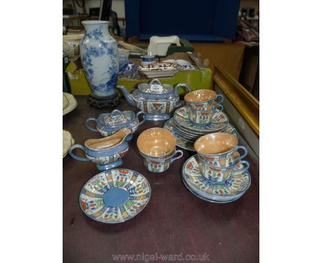 A Japanese Teaset in blue/white with gilt lustre including teapot, sugar bowl and milk jug, six cups and saucers, six side pl