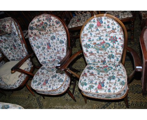 A pair of Ercol Prince of Wales feathers splat-back lady's and gentleman's Chairs the cushions upholstered in Sanderson's Hog