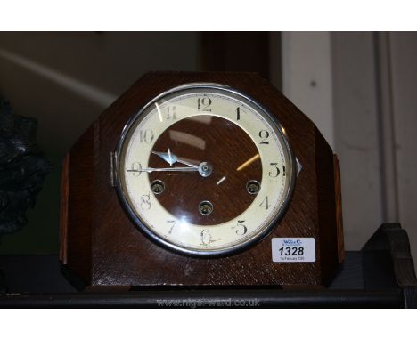 An Oak Mantle clock with three-train movement, no key.