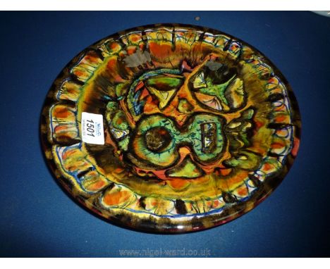 A Keraluc, Quimper, a highly decorative plate painted by Paul Yvain, 1950's, fully signed and labelled verso.  In excellent c