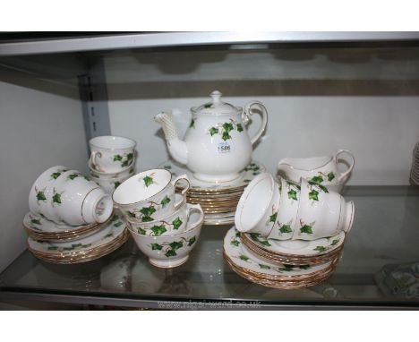 A quantity of Colclough Ivy leaf dinner and tea ware including dinner, salad and side plates, cups and saucers, sugar bowl, j