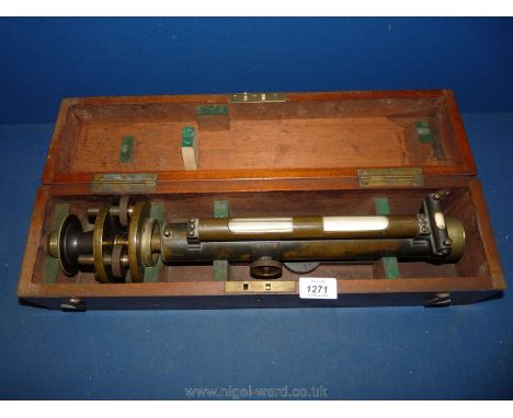 A Mahogany cased heavy brass level (Theodolite) engraved ''Baker, 244 High Holborn, London'' having longitudinal and horizont