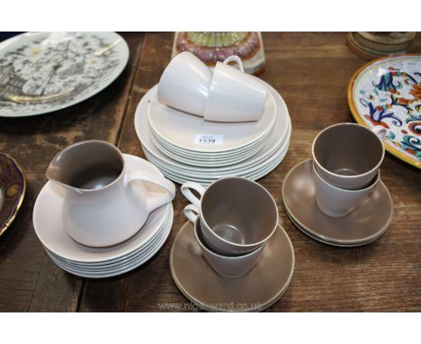 A quantity of Poole dinner and tea ware including six each dinner and side plates, cups, saucers, dessert bowls and milk jug 