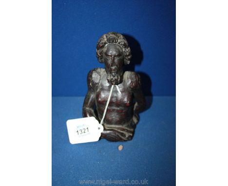 A small early 17th c. English Oak carving of a male herm, originally the head of a pilaster from an item of furniture, 6'' x 