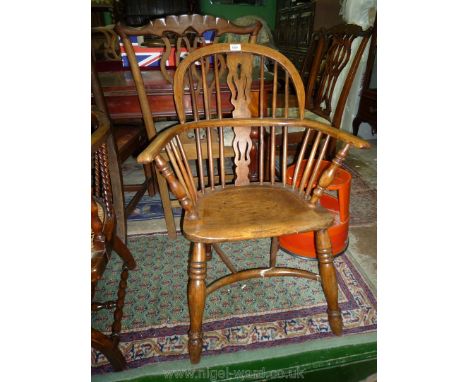 A Crinoline stretcher stick-back fret-worked splat Elbow Chair with solid seat and turned legs. (Crinoline stretcher requires