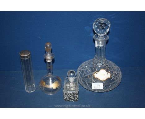 A vintage scent bottle with gold decoration, glass scent tube, scent bottle and cut glass decanter with Port label.
