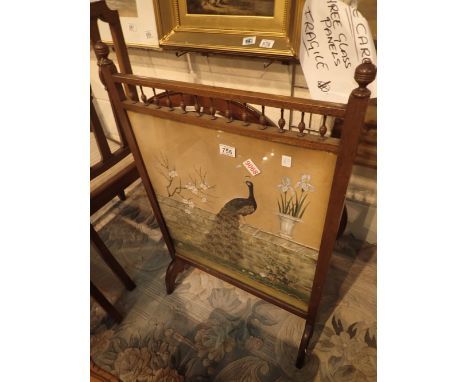 Mahogany firescreen with embroidered peacock under glass H: 87 cm