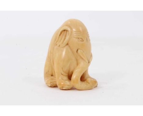 Japanese carved ivory netsuke, in the form of an elephant, faint two character signature, 3cm highCondition report: Some very