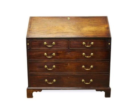 George III mahogany bureau, with fitted interior and two short over three long graduated drawers, each with original brass fi
