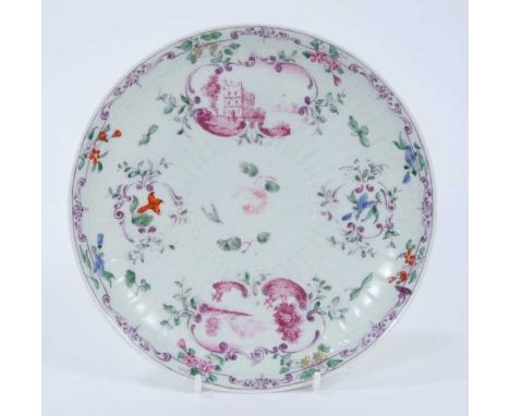 Worcester pleat-moulded saucer dish, circa 1756-58, painted in the Meissen style with puce landscapes in scrollwork panels, f