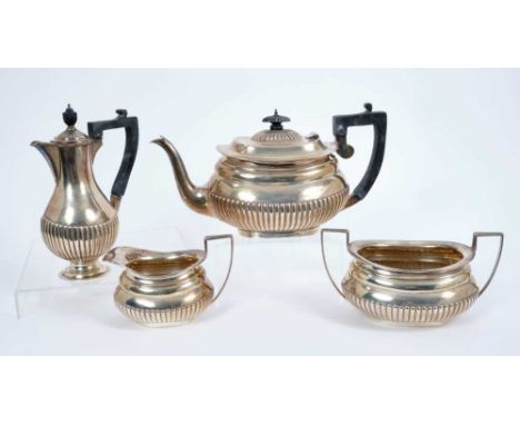 Victorian silver three piece tea set, comprising teapot of half fluted form, with angular Ebony handle and hinged domed cover