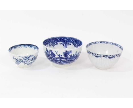 A Liverpool blue and white tea bowl and two Worcester blue and white tea bowls