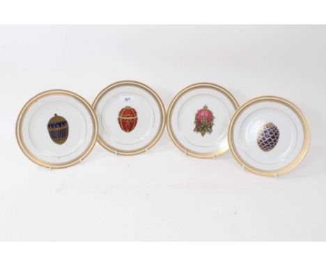 Set of four modern ‘Fabergé Fine China’ dishes decorated with Imperial Easter eggs, printed marks, 20cm diameter.Provenance: 