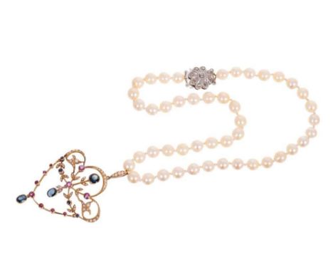Edwardian ruby, sapphire and seed pearl pendant on cultured pearl necklace, the pierced gold openwork pendant with ruby and s