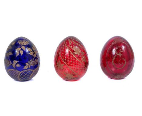 Three Russian etched glass eggs, each with Fabergé label to underside, 6.5cm high.Provenance: The Lady Elizabeth Shakerley Co