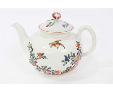 An early Worcester teapot, circa 1754-55, polychrome painted in the Chinese style with a fence-type pattern, with non-matchin