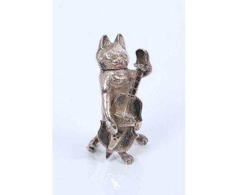 A charming novelty silver model of a cat playing a cello, the lid/head is detachable, Dutch hallmarks to the tail. Approximat