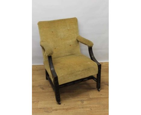 Chippendale style mahogany Gainsborough armchair, with lattice blind fret carving, on later castors 