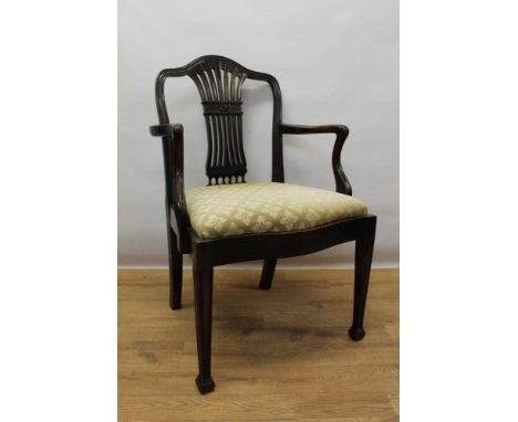 Three various 19th century elbow chairs, including a fruitwood country chair with bowed seat, a Chippendale style chair with 