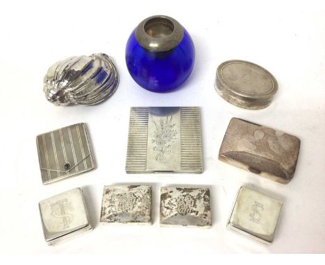 Six silver boxes, a compact and a match case, together with a white metal mounted shell and a silver mounted glass match stri