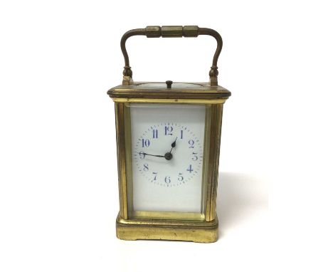 Early 20th century French brass repeating carriage clock with enamel dial, movement signed E.G.L. Paris.16.5 cmCondition repo