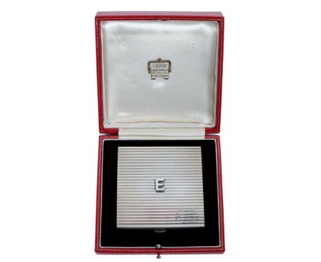 Lady Elizabeth Shakerley C.V.O. (1941-2020), Cartier silver powder compact of square ribbed form with central E monogram (HM 