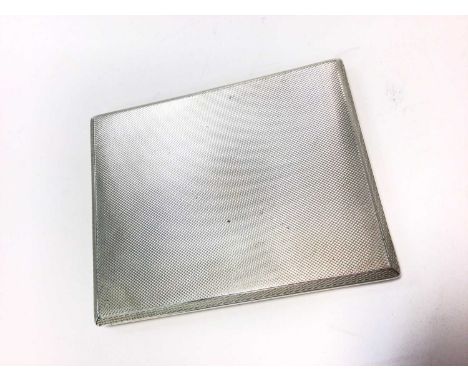 George V silver cigarette case of rectangular from with engine turned decoration, sliding opening action with gilded interior